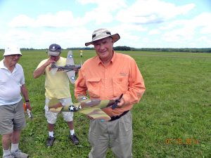 Tom Arnold with his P-39 Airacobra.