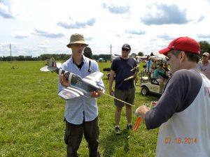 Tom Hallman finishes winding his beautiful Seafire for the final round of the WWII Mass Launch competition.