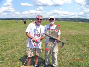 The winning team: Wally Farrell with his winning plane and his trusty mechanic, John Ernst.