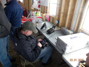 Plenty of benchwork is available for battery charging and radio tuning.