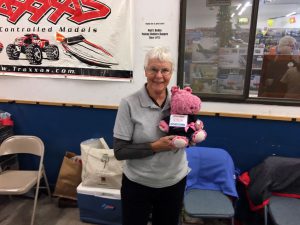 Jan Throne, Walt's wife, holding 'Lola' the ever present mascot for Walt's HobbyTown. Jan did the honors running the event tables and passing out the free door prizes.