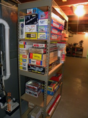 Gorilla Rack shelves with model kits to be built...my motivation for building this workshop!