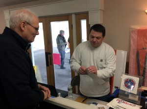 Ed Britton (r) describing his custom vinyl cutting products with Steve Dwyer